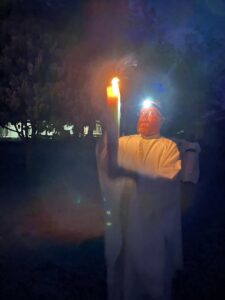 Fr Alan Neville MSC Lights the Paschal candle