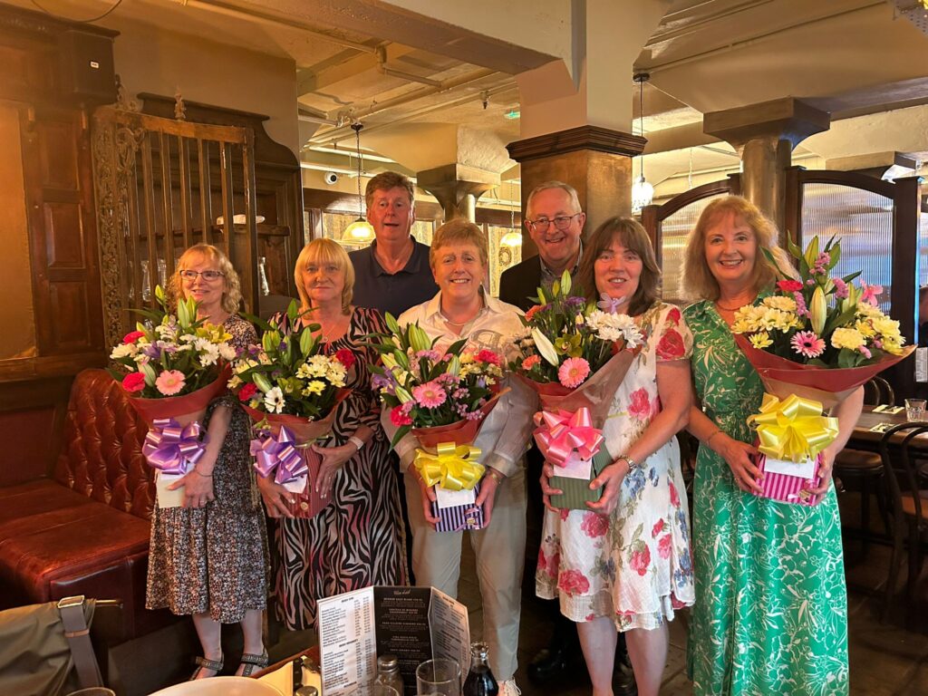 Fr John Fitzgerald and Fr Joe McGee celebrate the long-service awards of Anne, Patricia, Mary, Fiona, and Ann - not forgetting Maura, who wasn't able to be with us on the day.